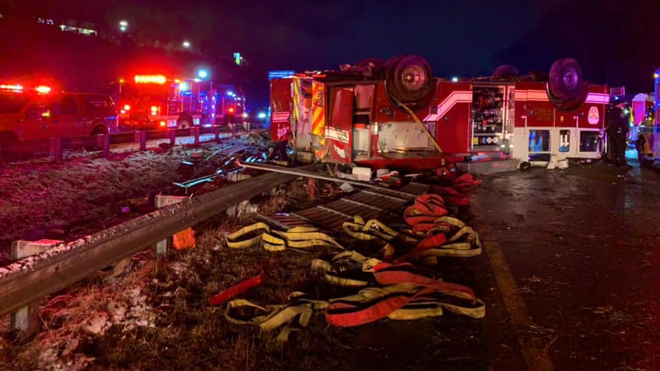 Four Asheville, NC, firefighters were injured in a rollover crash Saturday.