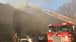 Montgomery County, MD, firefighters used an aerial to rescue a person from the third floor of a burning apartment building in Gaithersburg on Sunday.