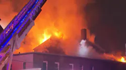 Roughly 100 firefighters from multiple departments worked for hours to put out a stubborn four-alarm fire that erupted at a church rectory in Lawrence, MA, on Monday.