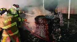 Mobile, AL, firefighters worked for hours to extinguish burning paper bales during a three-alarm fire early Tuesday.