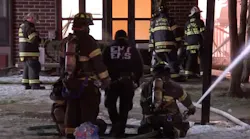 Two firefighters were injured battling a four-alarm fire that destroyed a Pleasantville, NJ, warehouse early Tuesday.