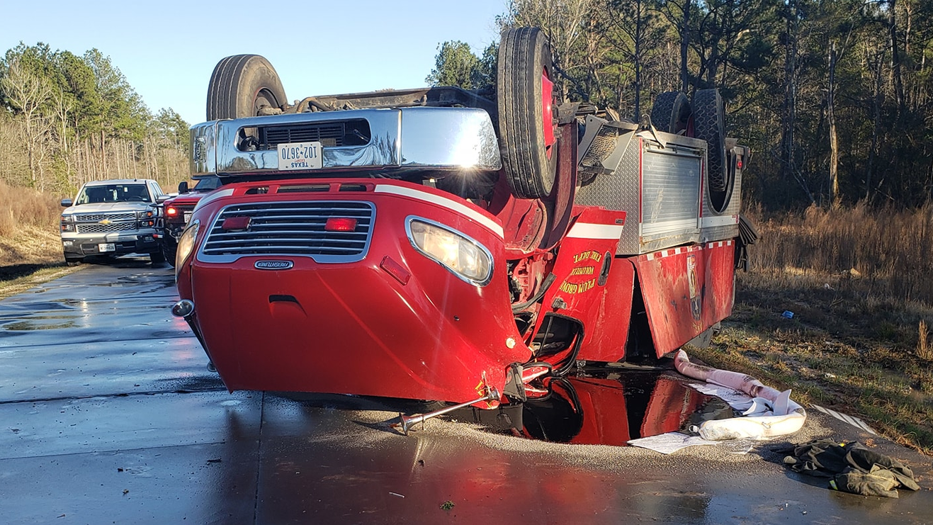 Three Plum Grove, TX, firefighters were injured after the tanker they were in rolled over on the way to a fire call Sunday.