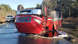 Three Plum Grove, TX, firefighters were injured after the tanker they were in rolled over on the way to a fire call Sunday.
