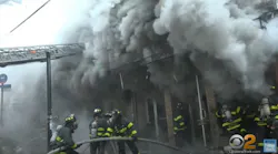 Two FDNY firefighters were injured battling a massive five-alarm blaze that tore through Queens dollar store early Sunday.