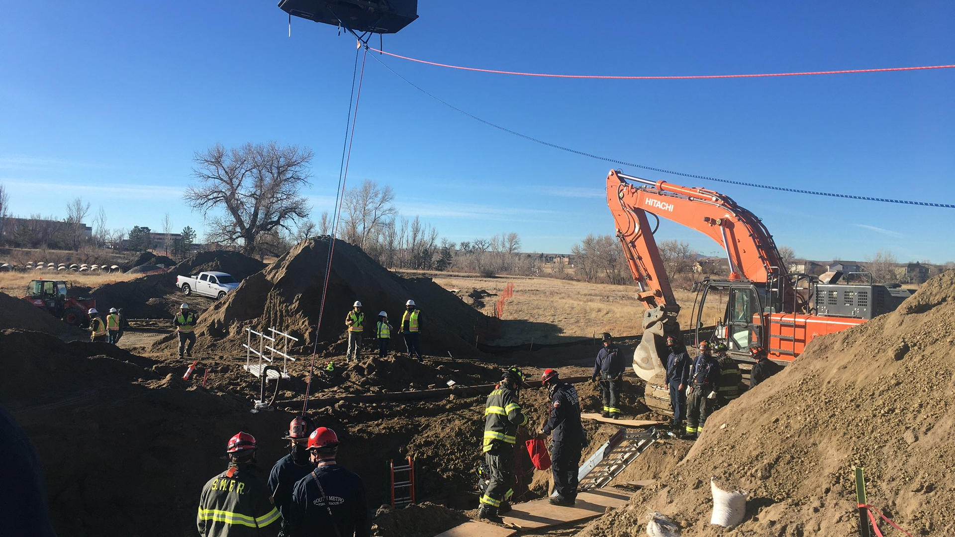 South Metro firefighters rescued an injured worker who had fallen into a trench box at a Parker, CO, construction site Tuesday.