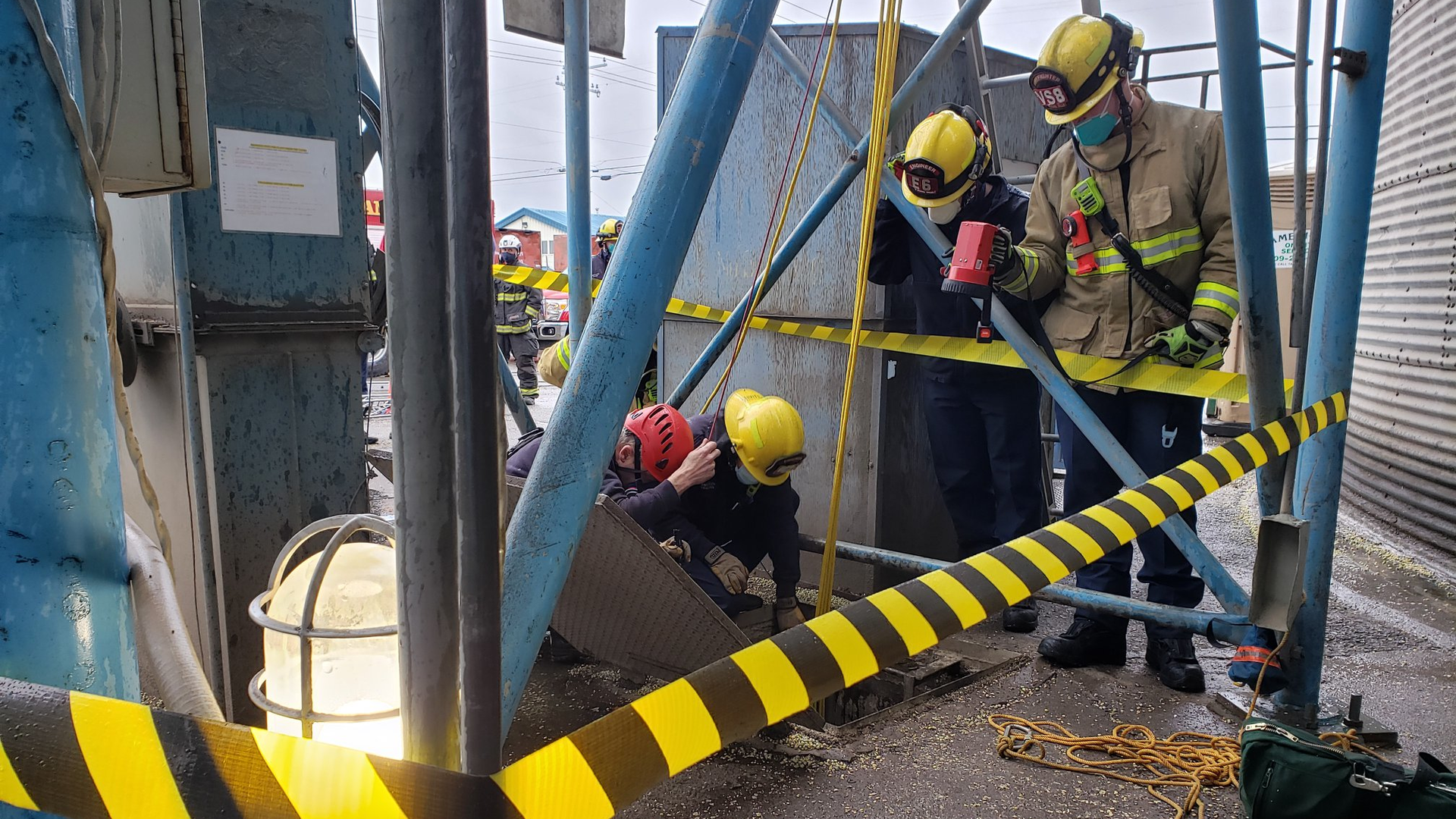 Spokane Valley, WA, firefighters rescued a man who fell 19 feet down a grain elevator at a processing plant Monday.