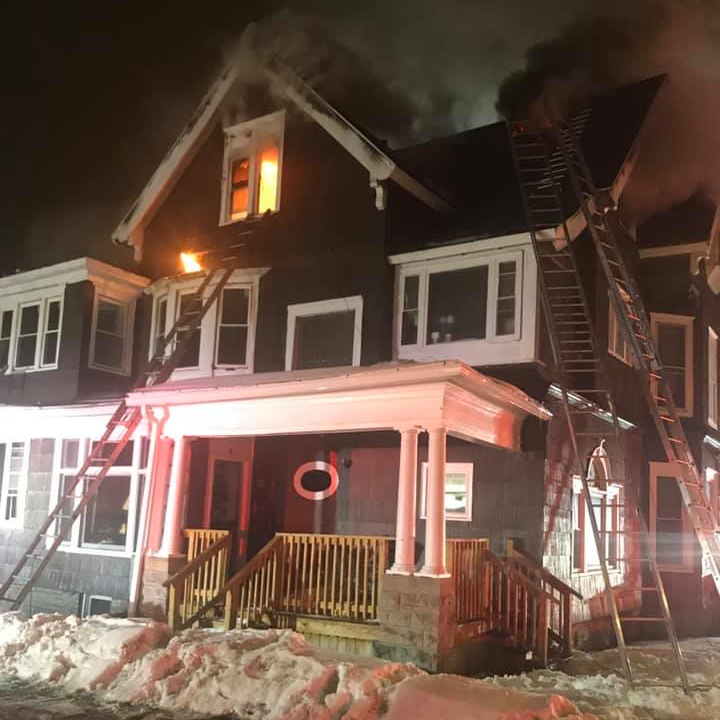 A Syracuse, NY, suffered burns while battling an apartment fire early Tuesday.