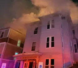 Worcester firefighters called five alarms to contain a fire in a three-story, mutli-family home Friday night.