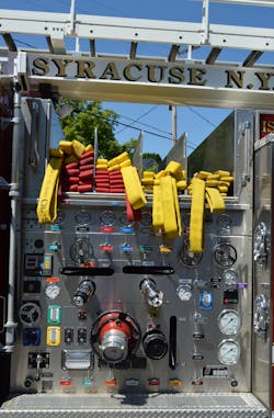 The Syracuse, NY, Fire Department uses a 60-inch-wide panel to accommodate four crosslay hosebeds along with the cradle for the TeleSqurt boom, with a standardized layout for all of the instruments, gauges and controls. Note the handrail locations and the use of an aggressive nonslip insert on the pump panel step. The Syracuse, NY, Fire Department uses a 60-inch-wide panel to accommodate four crosslay hosebeds along with the cradle for the TeleSqurt boom, with a standardized layout for all of the instruments, gauges and controls. Note the handrail locations and the use of an aggressive nonslip insert on the pump panel step.