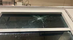 The window of a Boulder, CO, Fire Department apparatus was damaged when parties in the city's University Hill neighborhood spun out of control Saturday.