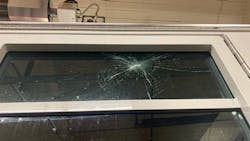 The window of a Boulder, CO, Fire Department apparatus was damaged when parties in the city's University Hill neighborhood spun out of control Saturday. The window of a Boulder, CO, Fire Department apparatus was damaged when parties in the city's University Hill neighborhood spun out of control Saturday.