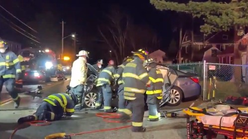 Brockton, MA, firefighters worked for 35 minutes to free a woman trapped in her car following a head-on collision Sunday.