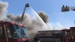 Two Buffalo, NY, firefighters were injured battling a three-alarm fire Tuesday.