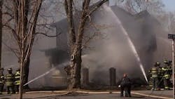Two firefighters were injured battling a house fire in Voorhees, NJ, on Monday. Two firefighters were injured battling a house fire in Voorhees, NJ, on Monday.