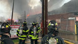 Two FDNY firefighters and an EMS member were injured during a five-alarm fire that broke out at a Staten Island warehouse Wednesday. Two FDNY firefighters and an EMS member were injured during a five-alarm fire that broke out at a Staten Island warehouse Wednesday.