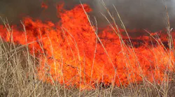 Multiple departments battled a grass fire that burned 880 acres near Richardton, ND, on Monday.