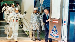 On Dec. 21, 1968, the Apollo 8 crew leaves the Kennedy Space Center's then-named Manned Spacecraft Operations Building during the mission's prelaunch countdown on the way to their history-making lunar orbiting flight. Commander Frank Borman (waving) leads the crew, followed by astronauts Jim Lovell, command module pilot; and William Anders, lunar module pilot. On Dec. 21, 1968, the Apollo 8 crew leaves the Kennedy Space Center's then-named Manned Spacecraft Operations Building during the mission's prelaunch countdown on the way to their history-making lunar orbiting flight. Commander Frank Borman (waving) leads the crew, followed by astronauts Jim Lovell, command module pilot; and William Anders, lunar module pilot.