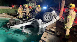 Orange County firefighters at the scene a crash between a pickup and car that left three dead.