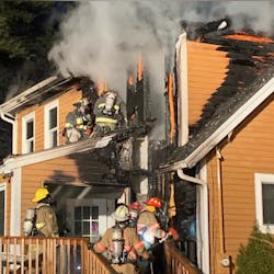 Crews from a dozen departments battled a two-alarm fire that broke out at the home of Kingston, NH, Fire Department's chief Sunday. Crews from a dozen departments battled a two-alarm fire that broke out at the home of Kingston, NH, Fire Department's chief Sunday.
