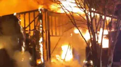A Prince George's County, MD, firefighter suffered burns after a roof collapse during a residential fire in Landover early Sunday.