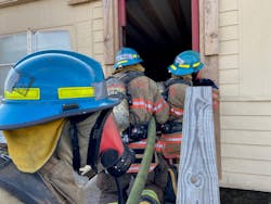 In the “run” phase, training moves to an acquired trailer house, and students advance to the fire with blackout masks in their facepieces. In the “run” phase, training moves to an acquired trailer house, and students advance to the fire with blackout masks in their facepieces.