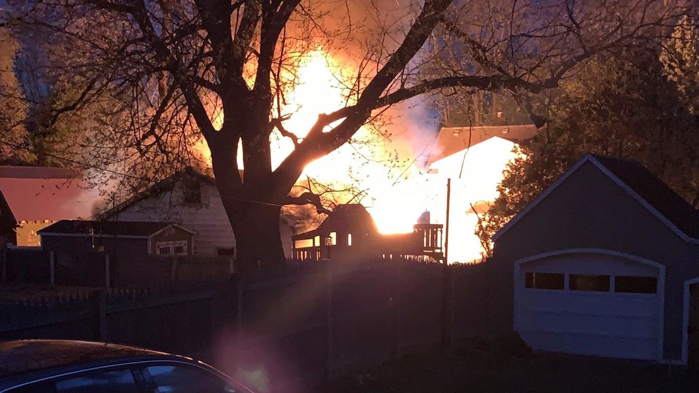 An Auburn, NY, firefighter was taken to the hospital after falling from a ladder during a fire that damaged a garage and an RV on Wednesday.