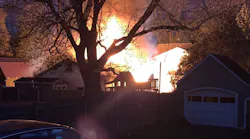 An Auburn, NY, firefighter was taken to the hospital after falling from a ladder during a fire that damaged a garage and an RV on Wednesday.