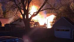 An Auburn, NY, firefighter was taken to the hospital after falling from a ladder during a fire that damaged a garage and an RV on Wednesday.