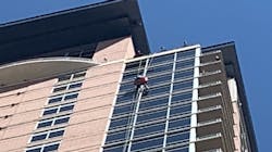 Austin, TX, firefighters and Austin-Travis County EMS crews performed a high-angle rescue to save a man dangling from an emergency rope on the side of a skyscraper Thursday. Austin, TX, firefighters and Austin-Travis County EMS crews performed a high-angle rescue to save a man dangling from an emergency rope on the side of a skyscraper Thursday.