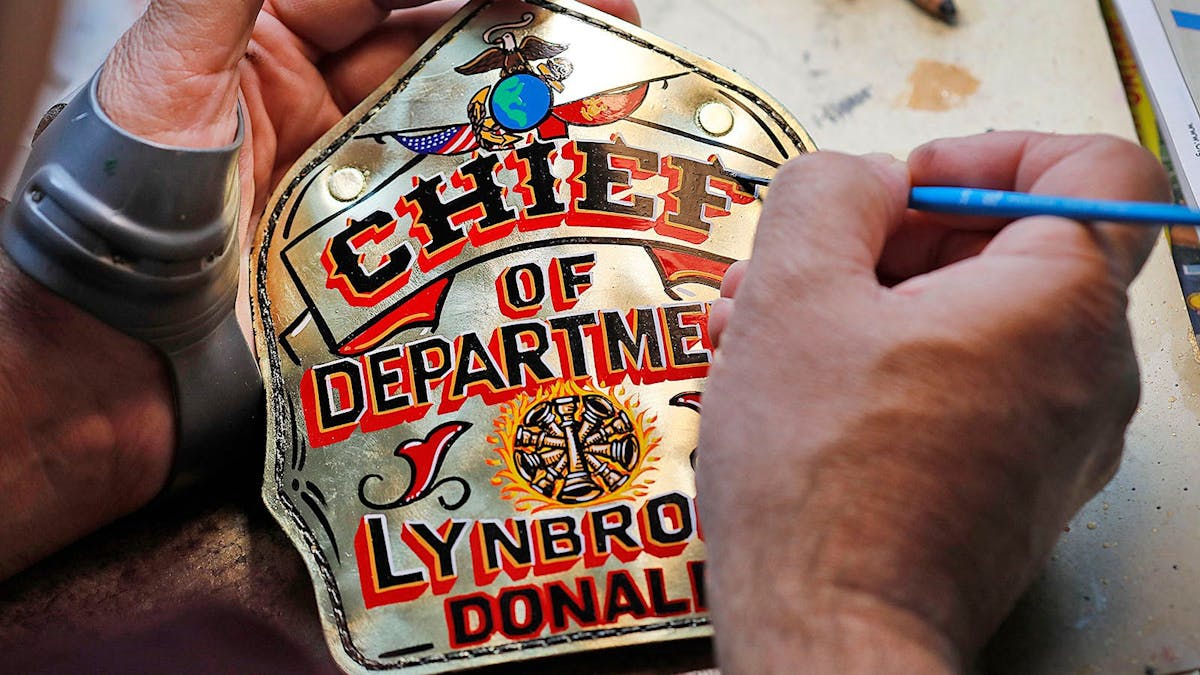 MA Artist Leaves Mark on Thousands of FFs' Helmet Shields Firehouse