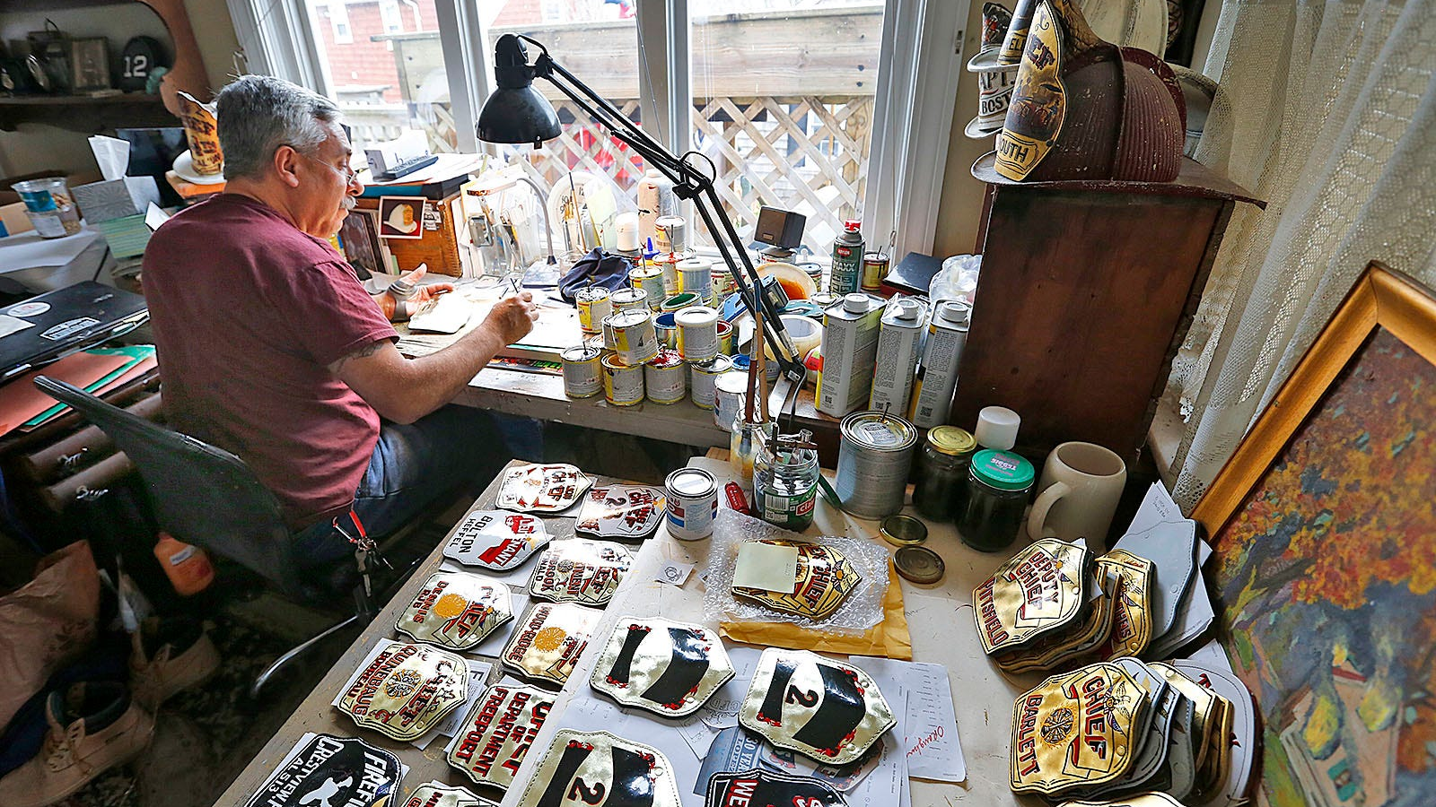 MA Artist Leaves Mark on Thousands of FFs' Helmet Shields Firehouse