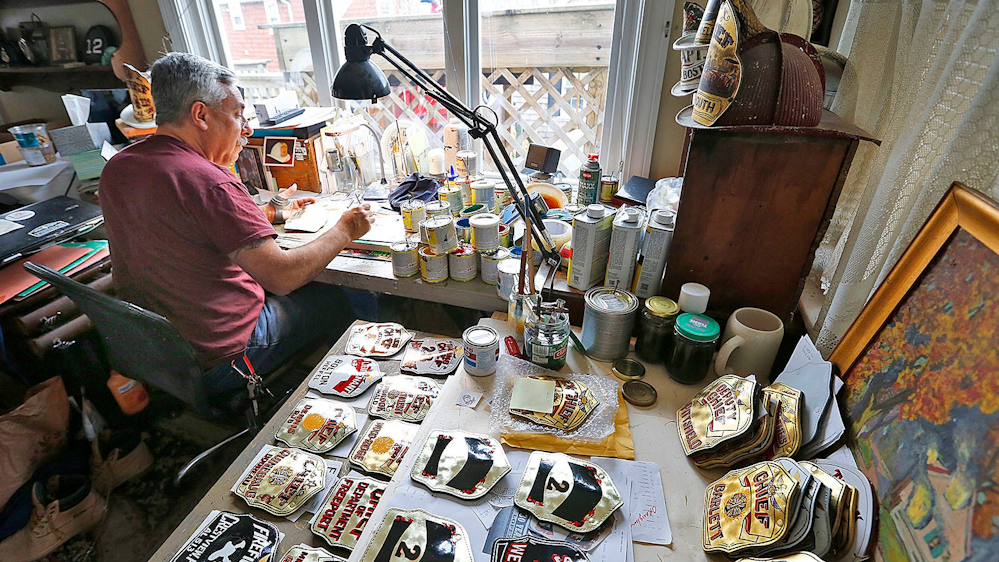 MA Artist Leaves Mark on Thousands of FFs' Helmet Shields Firehouse