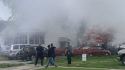 Champaign, IL, firefighters rescued four people from a burning house Thursday. Champaign, IL, firefighters rescued four people from a burning house Thursday.