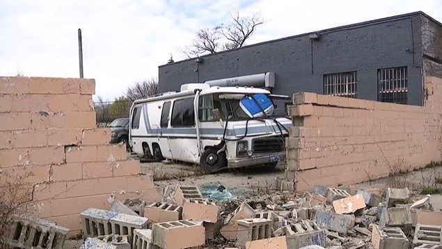 A Detroit Fire Department EMS unit carrying a patient crashed into a brick wall following an accident with an SUV on Sunday.