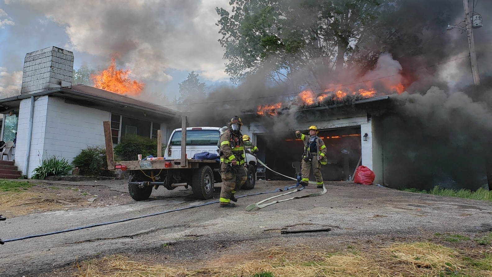 A Knox County, TN, Rural Metro Fire Department firefighter suffered a possible leg injury while battling a house fire Thursday.