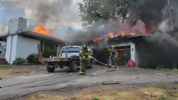 A Knox County, TN, Rural Metro Fire Department firefighter suffered a possible leg injury while battling a house fire Thursday.