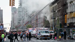 FDNY firefighters rescued a critically injured man from an Upper East Side apartment building fire that left another man dead Wednesday.
