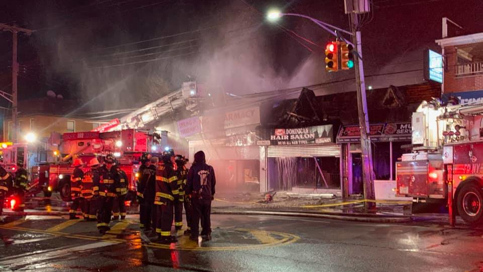 Two FDNY firefighters suffered serious injuries when they were trapped inside a burning Queens shop after a partial roof collapse early Saturday.