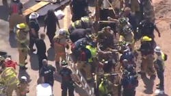 Firefighters rescued at least one construction worker after a partial trench collapse Wednesa=day Firefighters rescued at least one construction worker after a partial trench collapse Wednesa=day