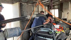 A Missoula, MT, Fire Department technical rescue team rescued a worker buried up to his neck in sand and concrete after he accidentally fell into a silo Wednesday. A Missoula, MT, Fire Department technical rescue team rescued a worker buried up to his neck in sand and concrete after he accidentally fell into a silo Wednesday.