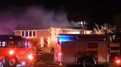 A Sauk Village, IL, firefighter was injured in a small explosion during a fatal house fire late Sunday.