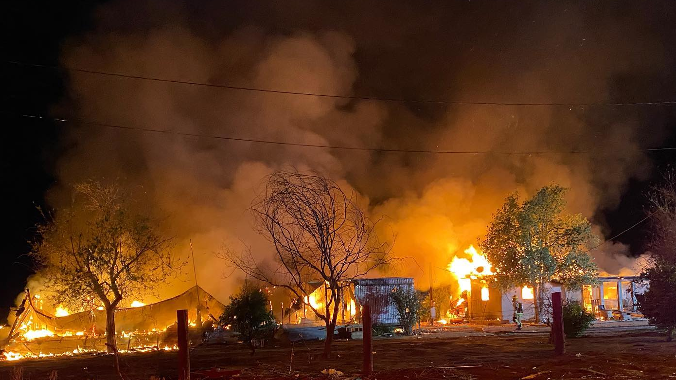 Surprise, AZ, firefighters faced exploding ammunition while battling a fire that engulfed two unoccupied mobile homes early Friday.