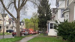 Syracuse, NY, firefighters rescued an unconscious woman from a burning house Wednesday. Syracuse, NY, firefighters rescued an unconscious woman from a burning house Wednesday.