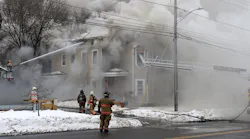 Syracuse, NY, firefighters battle a house fire on Feb. 19.