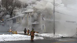 Syracuse, NY, firefighters battle a house fire on Feb. 19.