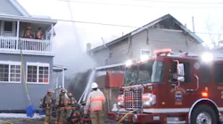More than 50 Syracuse, NY, firefighters battled a fire that broke out in a building that houses a convenience store and apartments on the city's north side Thursday.