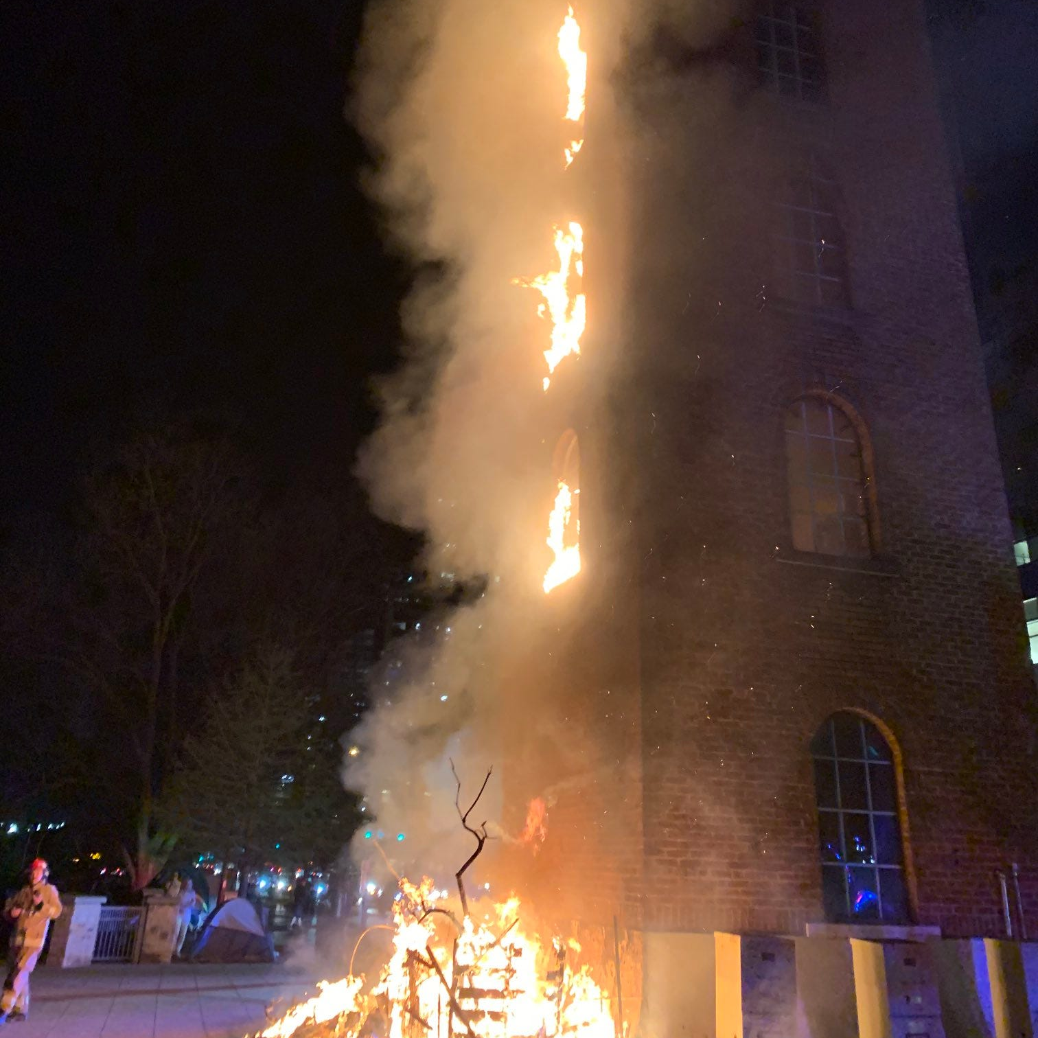 Austin fire officials on Thursday evening said the city's historic Buford Tower in downtown Austin was damaged when a fire nearby spread to the structure.