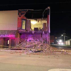 Firefighters rescued a couple who was trapped when their apartment in Nokomi, IL, partially collapsed early Wednesday. Firefighters rescued a couple who was trapped when their apartment in Nokomi, IL, partially collapsed early Wednesday.