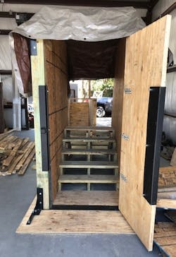 Forcible entry door props can include stairs and confined space walls built into them. Forcible entry door props can include stairs and confined space walls built into them.