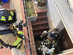 A member who is on the nozzle takes a position above the entry team and is ready with a charged hoseline should there be a need to knock back the fire. A member who is on the nozzle takes a position above the entry team and is ready with a charged hoseline should there be a need to knock back the fire.